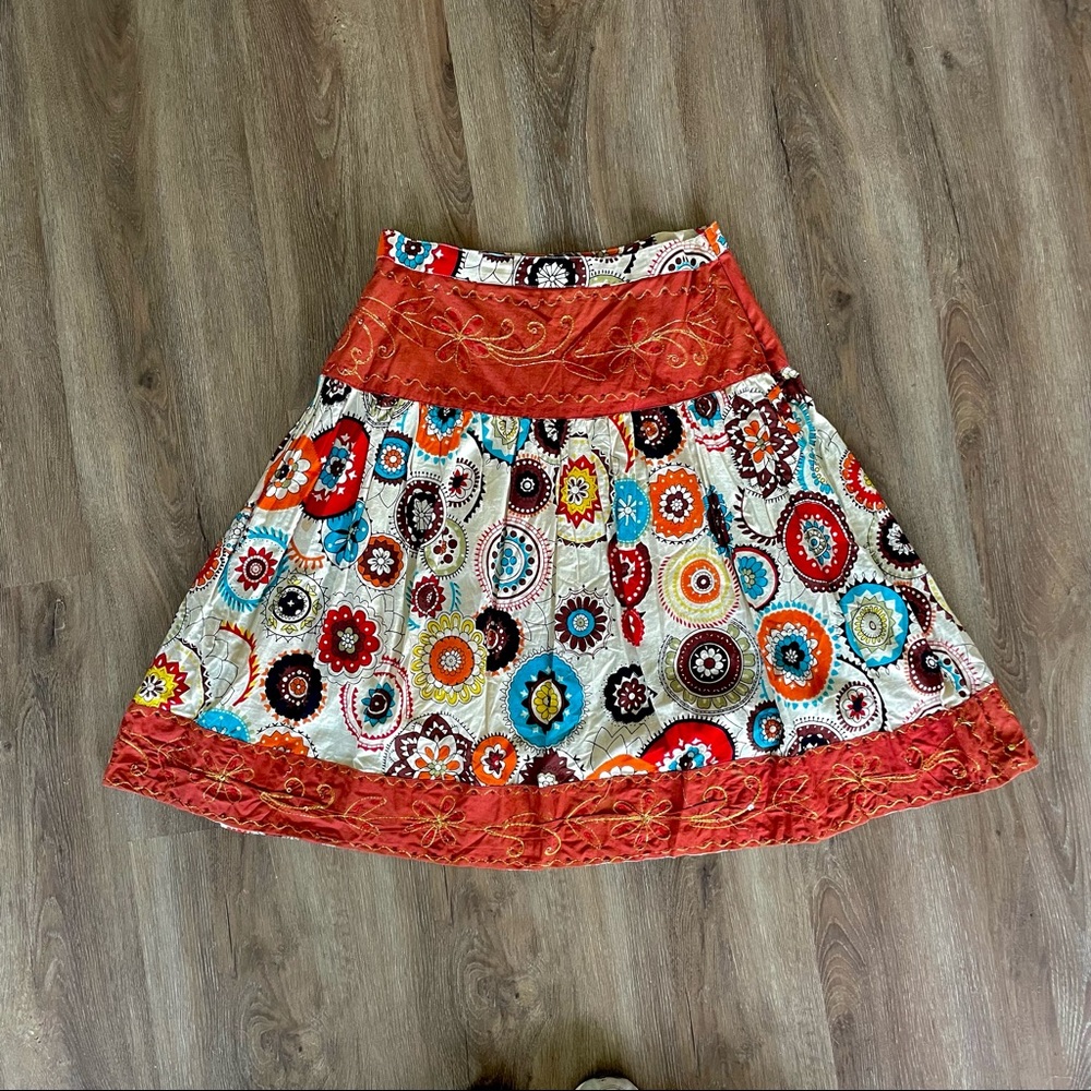 Flowy multi-colored pattern skirt with gold trim